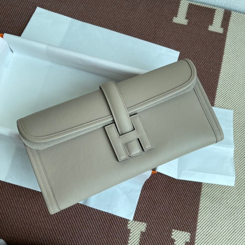 H**mes clutch bags